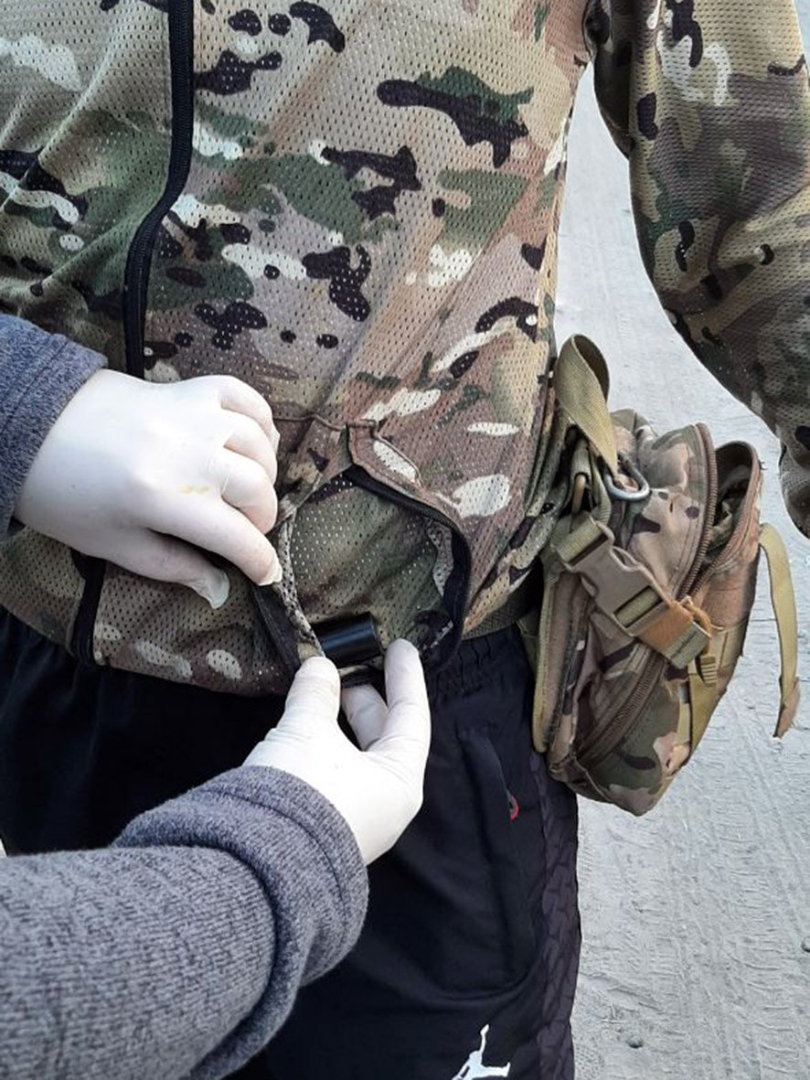 В Мелитополе рашисты задержали наркозакладчика в камуфляже 1